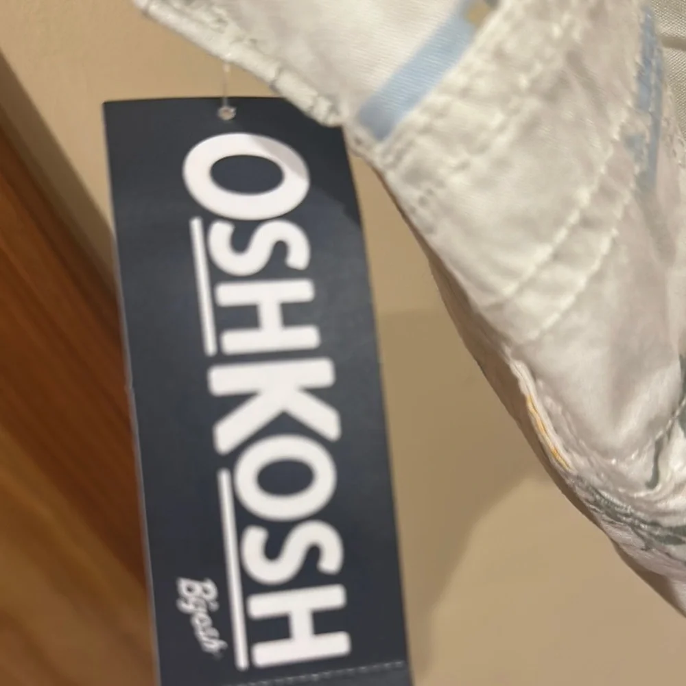OshKosh B'gosh White and Blue Overalls Distressed Design